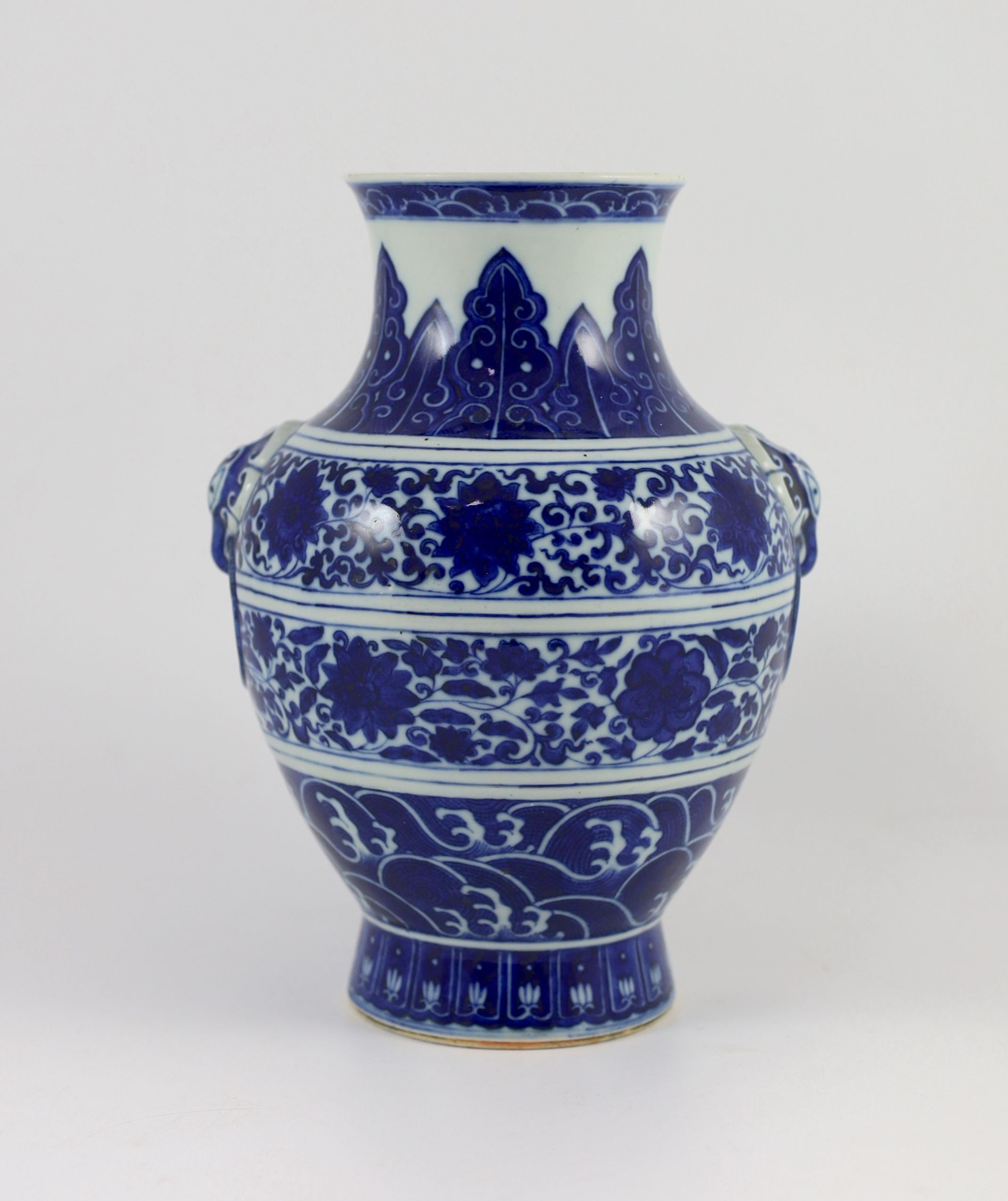 A Chinese archaistic blue and white vase, hu, Qianlong seal script mark but 19th century, 25cm high